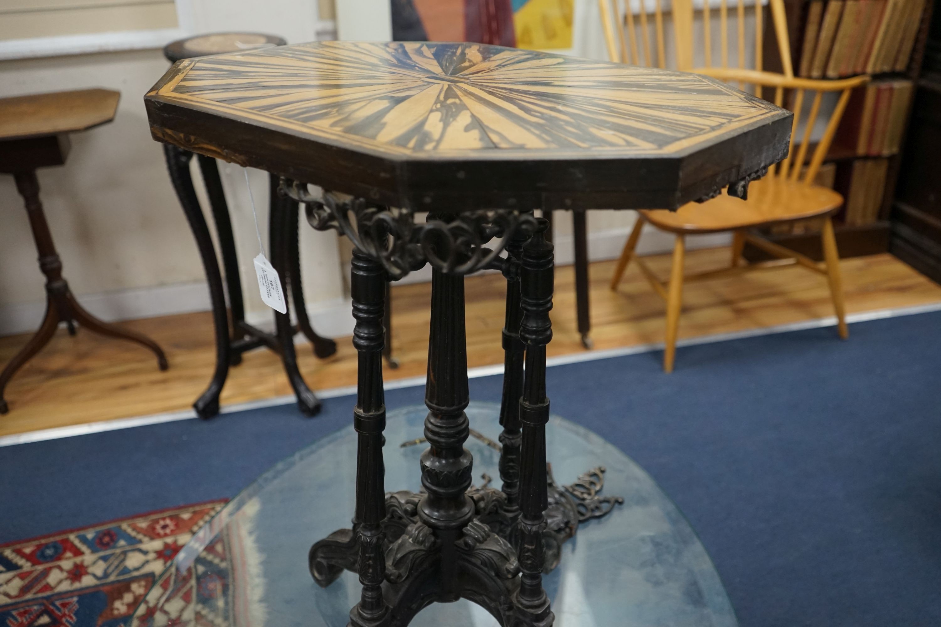 A 19th century Celanese carved ebony and coromandel veneered octagonal occasional table, width 57cm, depth 42cm, height 70cm